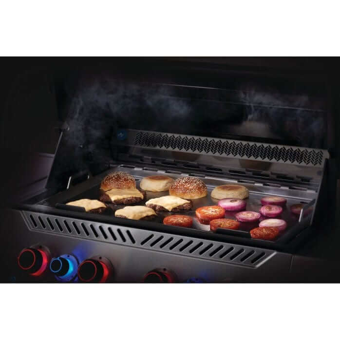 full-size stainless steel griddle insert for napoleon prestige rogue and 700 series grills in use on grill 
