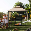A family enjoys a sunny day under the DirectDeals 13.5 x 4 Feet Patio BBQ Grill Gazebo Canopy with Dual Side Awnings, relaxing on lawn chairs near the grill while kids play on the slide.