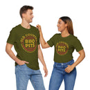 Unisex BBQ t-shirt worn by man and woman grilling together – premium fit, available at DDR BBQ Supply