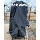An Old Country BBQ Pits Vertical Smokehouse is covered with a heavy-duty Old Country BBQ Pits Smokehouse Cover on a wooden deck near a fenced yard, with "Back view" at the top and leafless trees visible in the background.