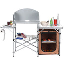 The DirectDeals Foldable Outdoor BBQ Portable Grilling Table With Windscreen Bag features a metal frame, shelves, sink, paper towel holder, utensil and food storage, plus a 2-shelf compartment for all your camping needs.