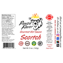 A hot sauce label displaying a bear with sunglasses and flaming hair, the text “Pawpa Flavor Scortch Hot Sauce” and “Pawpa Flavor LLC,” nutrition facts, vegan and gluten-free icons, and social media details on a white background. Infused with fiery Carolina Reaper peppers, this extreme hot sauce from Pawpa Flavor LLC is proudly vegan friendly.