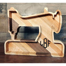 Decorative handmade wood tray shaped like a vintage sewing machine – a charming and practical gift for quilters and sewing lovers