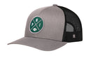 Show your team pride with the Haka Hat Philadelphia Trucker Hat | Black PHI X Football Snapback. This gray and black mesh trucker hat by Haka Hat features a round green front logo with crossed lines, the letters “P” and “H,” and a small football graphic at the bottom—making it an ideal choice for fans seeking an authentic PHI X football snapback look.