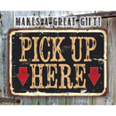 The Lone Star Art Pick Up Here - Metal Sign features large tan "PICK UP HERE" text with two red arrows, plus "MAKES A GREAT GIFT!" on weathered wood—ideal as restaurant signage or an indoor/outdoor decor piece.