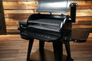 Black pellet grill with the lid open, featuring two stacked Pimp My Grill® Gen2 Slide-Out Rack System - 2 Racks for the Pit Boss Pro 850 / 850DX.