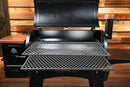Black Pit Boss Austin XL pellet grill equipped with the Pimp My Grill® Gen2 Slide-Out Rack System featuring two stacked, slide-out metal diamond-pattern cooking grates extended forward.