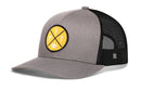 The Haka Hat Pittsburgh Football Trucker Hat, also known as the Yellow PIT X Snapback by Haka Hat, features a gray and black design accented with a yellow circular front patch displaying crossed P and T letters, two bats, and a central baseball—delivering bold style to any outfit.