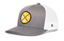 Show off your team spirit with the Haka Hat Pittsburgh Football Trucker Hat: a gray and white mesh snapback featuring a yellow circular patch on the front, highlighted by bold black crossed lines, the letters “PIT,” and a small football icon. This stylish Yellow PIT X Snapback from Haka Hat is perfect for any Pittsburgh football fan.