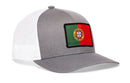 Haka Hat Portugal Flag International Trucker Hat featuring a grey and white mesh design with a rectangular patch on the front.