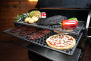 Two Pimp My Grill® Gen2 Slide-Out Rack System racks for the Recteq Flagship 1250 hold ribs, a pizza, a whole pineapple, potatoes, a large piece of smoked meat, and bell peppers.