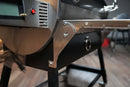 Stainless steel Pimp My Grill® Tactical Stainless Folding Front Shelf attached to a RecTeq RT-700 pellet grill, providing additional prep space.