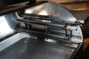 Interior of a stainless steel Recteq RT-800 / Deck Boss 800 featuring a Pimp My Grill® Gen2 Slide-Out Rack System with two stacked metal shelves.