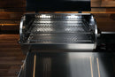 Two stacked metal slide-out grill racks from the Pimp My Grill® Gen2 Slide-Out Rack System - 2 Racks for the Recteq RT-800 / Deck Boss 800 inside a pellet smoker.
