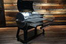 Recteq RT-800 / Deck Boss 800 with two Pimp My Grill® Gen2 Slide-Out Rack System shelves extended outward.