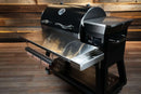 Pimp My Grill Tactical Stainless Folding Front Shelf for the Recteq RT-800 / Deck Boss 800 featuring an integrated paper towel holder and additional side tray for convenient grill prep.