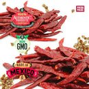 A vibrant arrangement of Rico Rico Dried Mexican Chiles 3-Pack—featuring authentic Ancho, Guajillo, and Arbol peppers—is displayed on a white background. Each chili is labeled with 100% Authentic Products, Non GMO, and Made in Mexico. Scattered seeds evoke the bold flavors found in every Rico Rico gourmet spice kit.