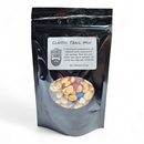 DDR BBQ Supply Manly Cans classic trail mix in a black resealable pouch with a clear window showing nuts and candy