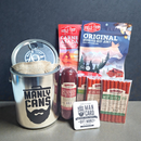 Gift the Manly Cans CANivore Plus Meat Gift Can—includes two packs of grass-fed beef jerky, summer sausage, beef sticks, and a “Here is your Man Card” coaster. All from Manly Cans.