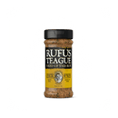 Rufus Teague Chick N’ Rub by Rufus Teague comes in a jar with a black lid and yellow label featuring a chicken illustration—ideal as a flavorful rub or seasoning for chicken and other poultry dishes.