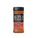 A jar of Rufus Teague Fish Rub seafood seasoning by Rufus Teague, featuring a black lid and a red-and-black label reading “Fixed Up This Rub” and “Fish Rub,” is shown against a plain white background. This blend is gluten-free.