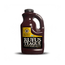 Rufus Teague Honey Sweet BBQ Sauce is a gluten-free barbecue sauce inspired by classic Kansas City flavors. This large plastic jug features a black cap and handle with a yellow and black "Rufus Teague Made Some Sauce" label.