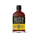 Rufus Teague Honey Sweet BBQ Sauce is a gluten-free Kansas City style barbecue sauce in a clear bottle with black cap and a black-and-yellow label featuring the brand name and bee graphic—perfect for BBQ lovers.