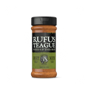 A 13.2 oz (375g) bottle of Rufus Teague Meat Rub by Rufus Teague, gluten-free, with a black lid and a green and black label marked "Sweet & Savory" and "Herbs & Spice.