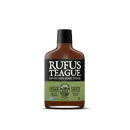 A bottle of Rufus Teague Steak Sauce with a black cap and green label reading "Loved Him Some Steak." This bold, gluten-free, Non-GMO sauce features fun phrases like "Beef Up Your Beef" and "One Fancy Topper.