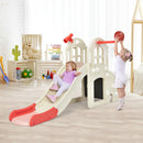 Two kids play indoors as one slides and another shoots hoops. The DirectDeals Double Camping Chair with Carry Bag Cup Holders sits nearby, along with stuffed animals in the background.