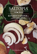 Sliced onion, garlic, parsley, and basil with SALTOPIA Infused Sea Salts KITCHEN'S KEEPER Italian Herbs & Garlic Salt. Everyday seasoning available at SaltopiaSalts.com.