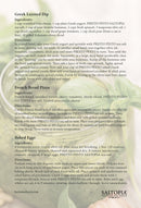 An image features Greek Layered Dip and Herbed Pizza, each enhanced with SALTOPIA Infused Sea Salts' Basil, Garlic & Lemon Salt: PRESTO PESTO. The rustic page background is accented by the SALTOPIA Salts logo in the bottom right.