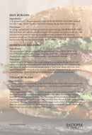 A recipe page displays three burger recipes—Best Burgers, Homemade Meatloaf, and Veggie Burgers—on a translucent overlay, with a close-up of a juicy burger seasoned with SALTOPIA Smoky Blended Salt: BURGER BUDDY in the background.