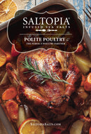 A golden roasted chicken, seasoned with SALTOPIA Infused Sea Salts’ Best Poultry Salt: POLITE POULTRY, sits in a baking dish with carrots, potatoes, and onions. The product branding appears over the image.