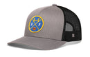 A gray and black mesh Haka Hat San Francisco Basketball Trucker Hat featuring a blue and yellow circular SF X patch with a bridge and basketball design on the front.
