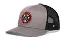 The Haka Hat San Francisco Football Trucker Hat | Black SF X Snapback features a classic Haka Hat signature trucker style in gray and black with a mesh back, and displays an SF X embroidered patch in red and yellow—complete with crossed football goalposts and a football—on the front.