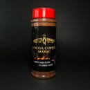 A black bottle of Scott’s Smoked Q Cocoa Coffee Magic Dry Rub for Brisket, Steak and BBQ, topped with a red lid and set against a solid black background. The label reads “Maryland Born, Florida Made.” This distinctive blend from Scott’s Smoked Q excels as both a flavorful brisket seasoning and a rich cocoa coffee dry rub, ideal for taking your BBQ dishes to the next level.