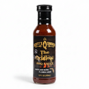 A glass bottle of Scott’s Smoked Q The Original Sweet Garlic BBQ Sauce with a black label featuring an illustration of a man, text reading The Original BBQ Sauce, and Maryland Born Florida Made.