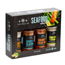 The Spice Lab Seafood Seasoning Collection by The Spice Lab showcases four flavorful seasoning jars—Smoky Seafood, Spicy Seafood, Shrimp & Crab Boil, and Lemon Pepper + Thyme—along with a distinctive Salmon Seasoning blend, all elegantly packaged in a boxed set adorned with vibrant seafood imagery.