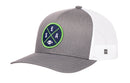 The Haka Hat Seattle Trucker Hat is a gray and white mesh-back snapback featuring a round front patch with “SEA” and a football design in blue, green, and white—part of the HAKA Signature 5.0 collection.