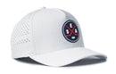 The Haka Hat Seattle Hockey Performance 5-Panel Hat | SEA X Flexfit Snapback is a white hat featuring a round logo with two crossed red hockey sticks, the letters “SEA,” and a small teal puck, shown from the left side. This water-repellent hat by Haka Hat includes a comfortable Flexfit sweatband for all-day wear.