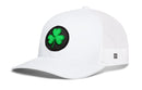 Haka Hat Shamrock Trucker Hat featuring a black snapback with a round patch displaying a green shamrock on the front panel.