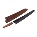 The Steelport Knife Co. 10" Bread Knife by Steelport Knife Co., featuring a long serrated blade, a wooden handle, and a matching wooden sheath resting above the blade, is displayed on a white background.
