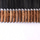 A row of knives—including the Steelport Knife Co. 4" Paring Knife, an American-made kitchen knife—features polished, light brown wooden handles and shiny metal ends, all aligned side by side on a white background.