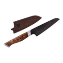 The Steelport Knife Co. 4" Paring Knife—a handmade kitchen knife featuring a patterned brown handle and a dark blade—is displayed alongside its matching wooden sheath.