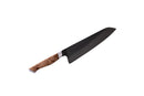 A Steelport Knife Co. Everyday Knife & Board Set featuring a wide black blade and a wooden handle, displayed against a white background.