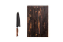 The Steelport Knife Co. Everyday Knife & Board Set by Steelport Knife Co. is displayed, featuring a chef knife with a wooden handle next to a large, dark wood cutting board with a parquet pattern on a white background.