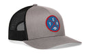 Show off your Nashville style with the Haka Hat Tennessee Football Trucker Hat | Columbia Blue TEN X Snapback, a gray and black snapback trucker hat by Haka Hat. This hat features a mesh back and a round front patch with a blue and red design, highlighting the letters T E N and a small football icon in the center—making it the perfect accessory for Tennessee football fans.