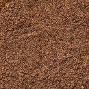 Close-up of Texas Salt Co. Hickory Smoked Salt, showing small, coarse brown granules with uneven crystals that offer a gritty texture and promise rich hickory BBQ smoke flavor.