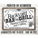 The Lone Star Art Backyard Bar & Grill Metal Sign features “Welcome. Sit and stay awhile. Backyard Bar and Grill. Sipping, Grilling and Chilling,” plus a hand with a beer mug—ideal, durable BBQ decor for making memories together.